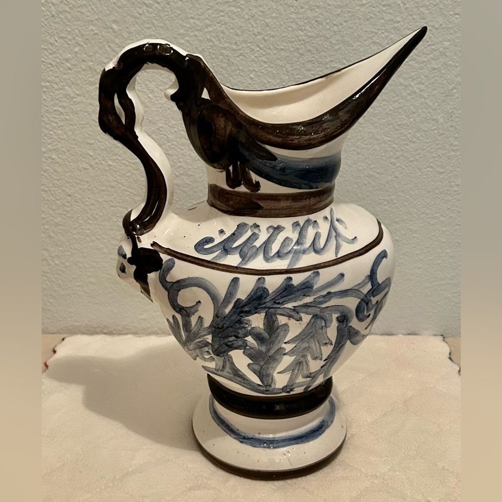 Beautiful hand fashioned pitcher.